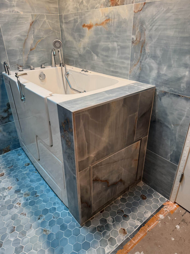 Bathtub with tile walls